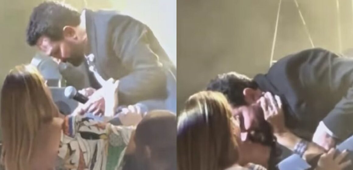 Luciano Camargo é beijado na boca por fã em show, mesmo casado