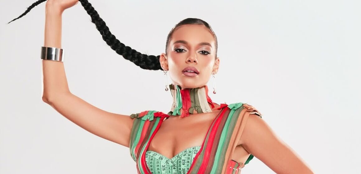Alane Dias homenageia costureiros com visual simbólico em ensaio da Grande Rio